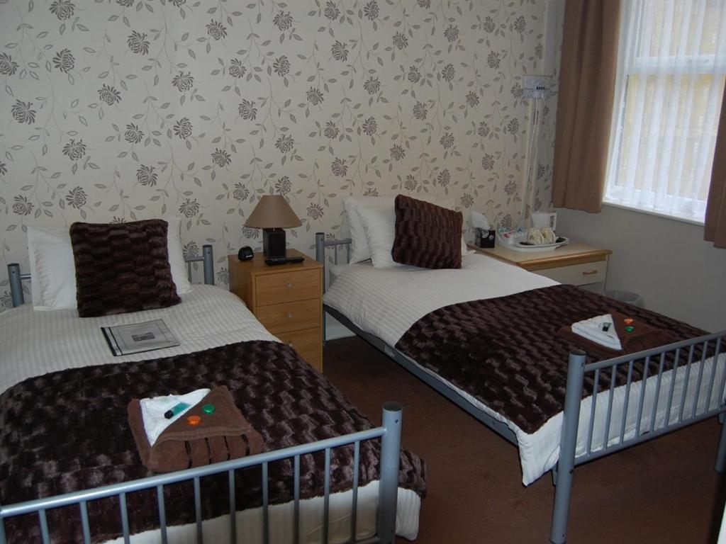 Habitación Doble con baño privado - 2 camas